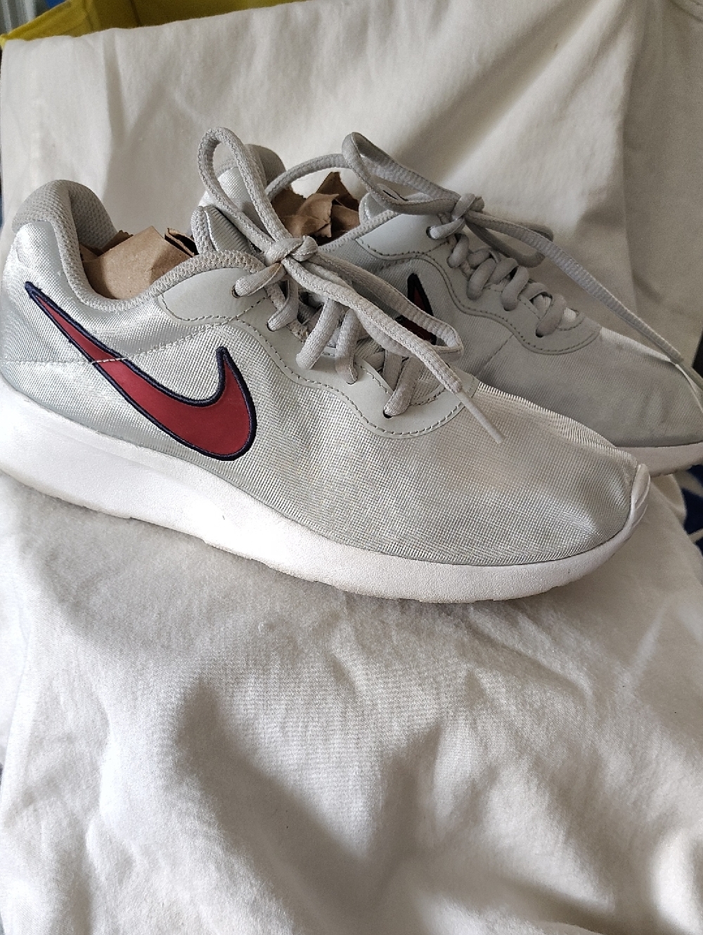Nike Women's Light Gray Athletic Sneakers with Red Swoosh